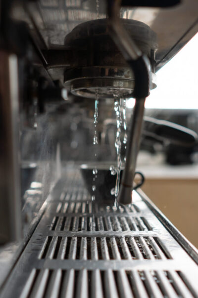 professional coffee machine in a bar close up.