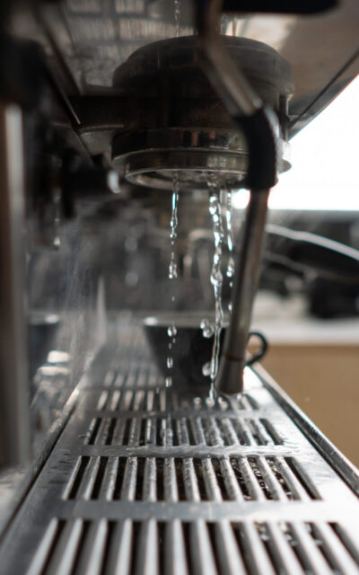 professional coffee machine in a bar close up.